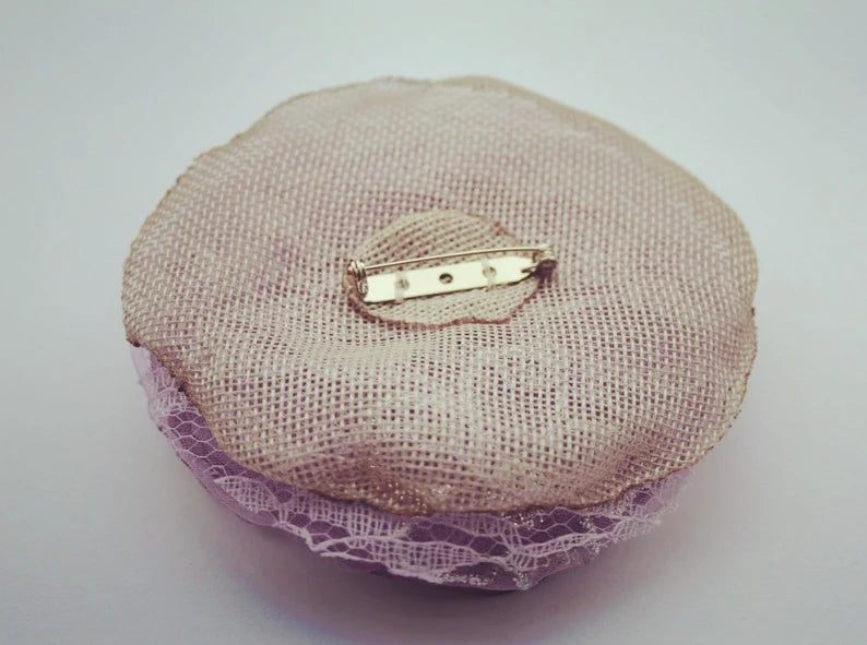 Purple fabric flower brooch